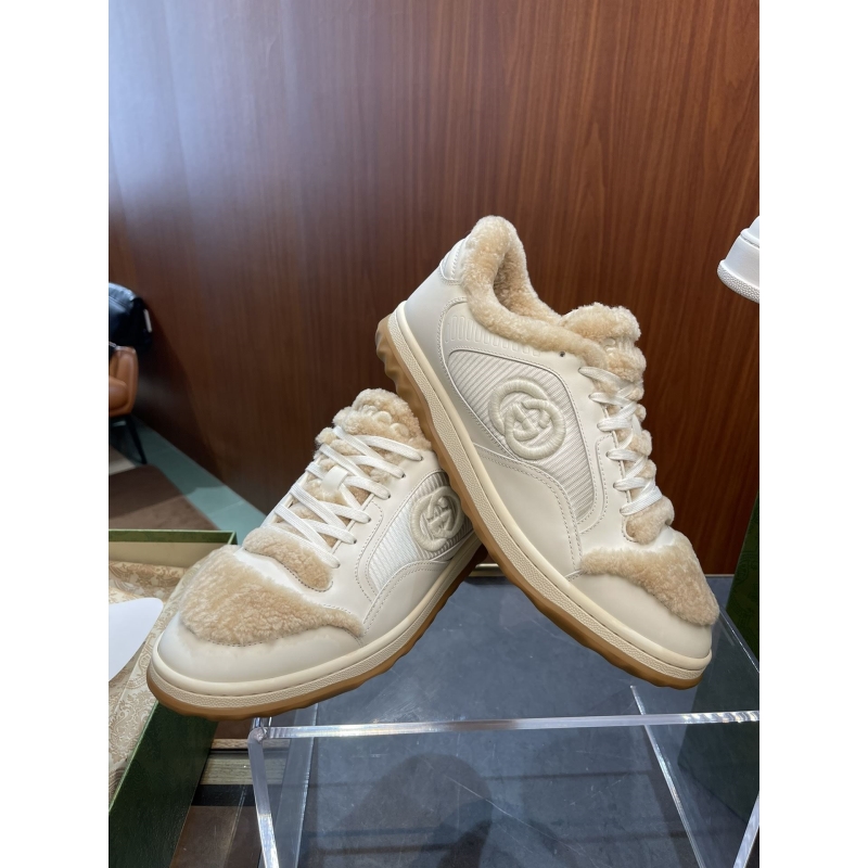 G*u*i sneakers